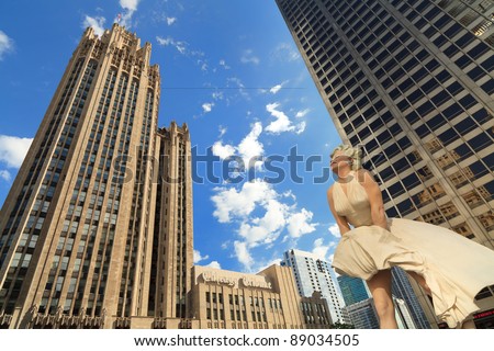 CHICAGO – AUGUST 21: The 26 foot tall sculpture of Marilyn Monroe\'s most famous pose by renowned artist Seward Johnson located on the Magnificent Mile on August 21, 2011 in downtown Chicago.