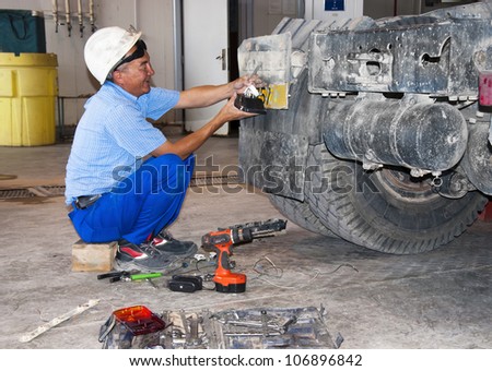worker repair the truck