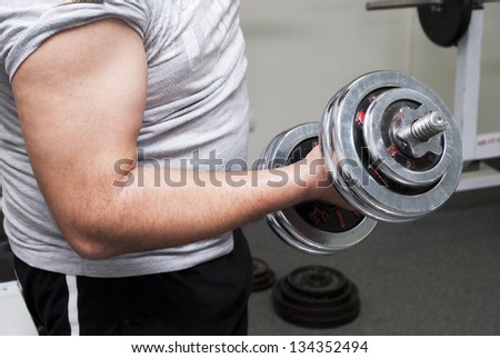 sports training with dumbbells