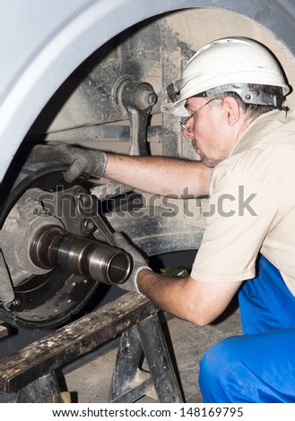 industrial area, worker repair truck