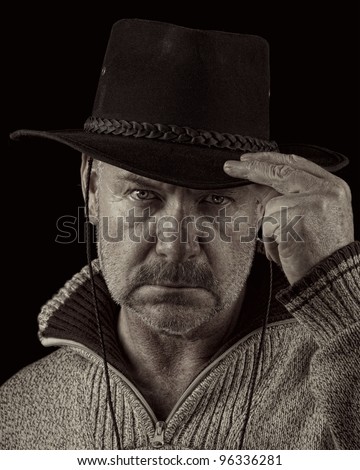 Cowboy tipping his hat