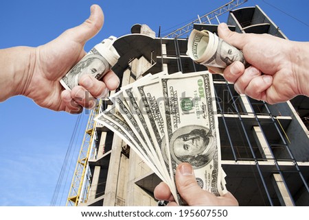Man\'s Hands in different poses with notes of US dollars against the house under construction