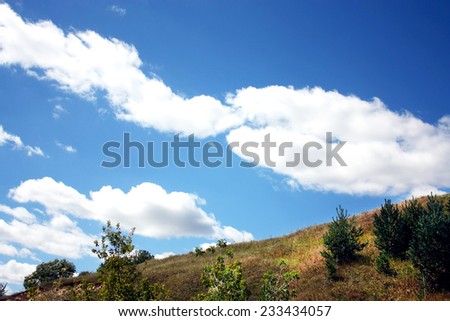 Beautiful summer landscape-horizon line between the sky and the mountain terrain