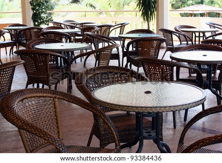 Little tables for coffee drink in morning cafe of hotel
