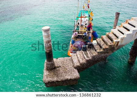 Concrete pier to the sea in Lan island, Thailand