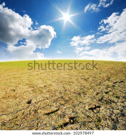 Soil cracked Background mud puddle marsh well blue sky rice