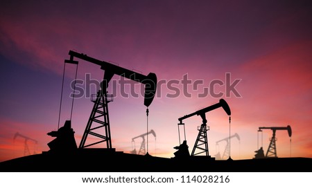 Oil pump oil rig energy industrial machine for petroleum in the sunset background for design