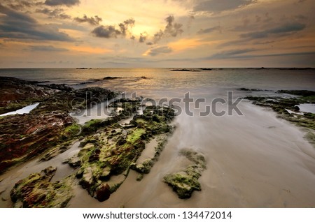 Sea rock stone sunset background nature landscape for design postcard calendar in thailand