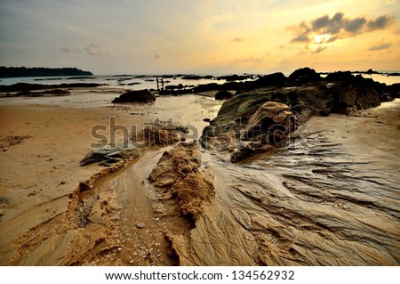 Sea rock stone sunset background nature landscape for design postcard calendar in thailand