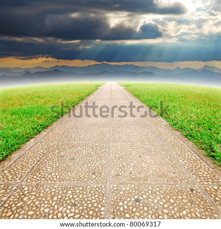 Way to destination for the future green grass cloudy beam