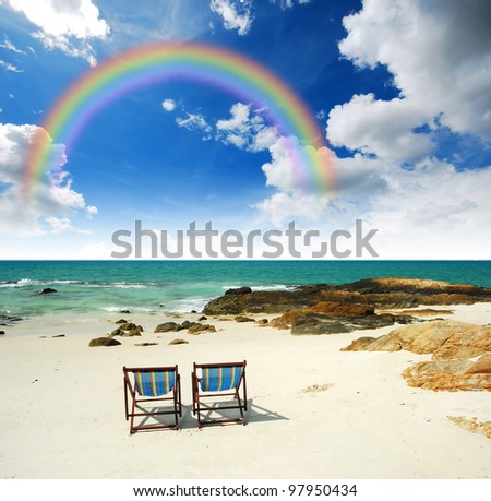 sea sand sun beach together blue sky chair alone background design stone clear rainbow