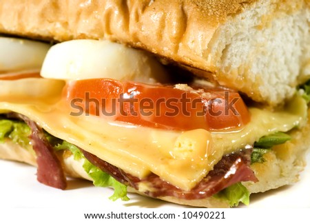 Close-up shot of questionably delicious looking bacon sandwich