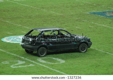 Old Car is Ready to be Crushed on a Football Game Afterhow
