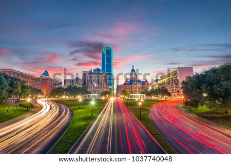 Dallas, Texas, USA skyline over Dealey Plaza at dawn.