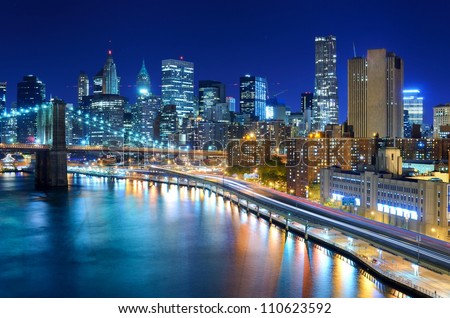 View of the financial district of Manhattan at night in New York City.