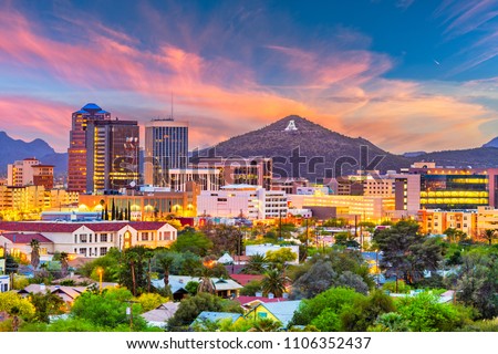 Tucson, Arizona, USA downtown skyline with Sentinel Peak at dusk. (Mountaintop \