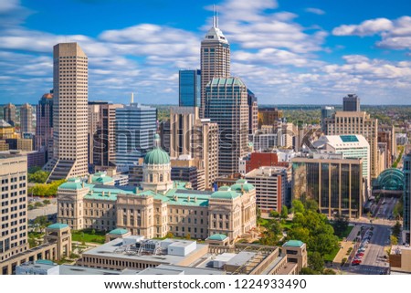 Indianapolis, Indiana, USA downtown city skyline with the State House in the afternoon.