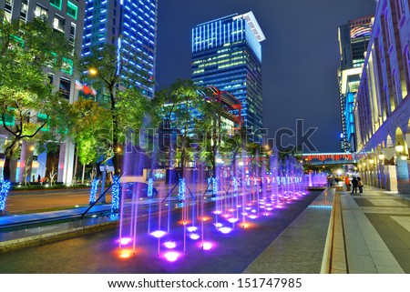 TAIPEI, TAIWAN - JANUARY 18: Fountains in the Xinyi District January 18, 2013 in Taipei, Taiwan. The district is the commercial and financial heart of the city.