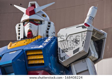 TOKYO - FEBRUARY 7: Gundam Mobile Suit Replica February 7, 2013 in Tokyo, JP. The 1/1 scale 18m tall statue was built as part of the 30th anniversary of the Gundam series.