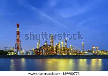 Oil refineries line a river in Yokkaichi, Japan. The city has been a center for the chemical industry since the 1930\'s.