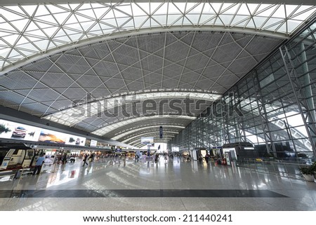 CHENGDU, CHINA - JUNE 4, 2014: Chengdu Shuangliu International Airport check in lobby interior. The airport is the busiest in western and central China.