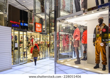 TOKYO, JAPAN - DECEMBER 29, 2012: UNIQLO clothing store in Tokyo. The fashion retailer is headquartered in Tokyo with hundreds of store locations in over a dozen countries.