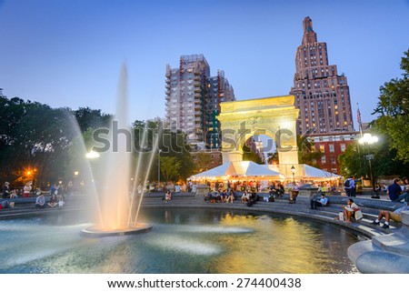 NEW YORK CITY - SEPTEMBER 12, 2012: Crowds gather at Washington Square Park. The historic park is popular in the summer.