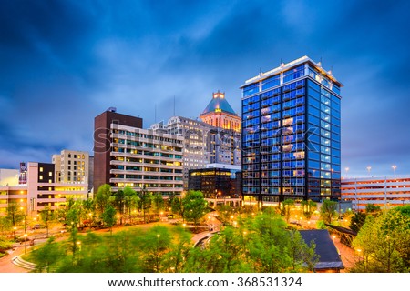 Greensboro, North Carolina, USA downtown city park and skyline.