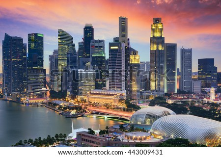 Singapore Financial District skyline at dusk.