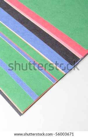 Construction paper spread out on white.