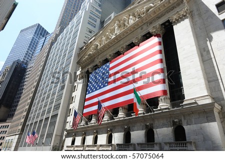NEW YORK CITY - JULY 12: The historic New York Stock Exchange with giant American Flag July 12, 2010 in New York, New York.