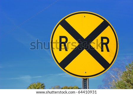 Railroad crossing street sign