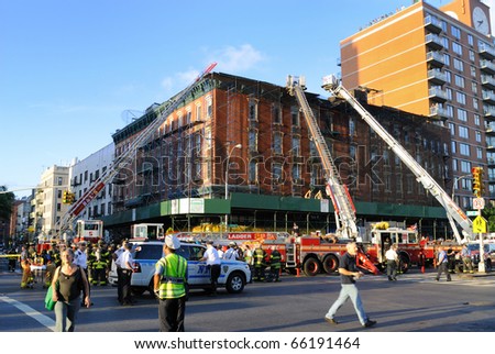 NEW YORK CITY - JULY 8: A crew of firefighters responds to a fire on Houston Street in the Lower East Side July 8, 2010 in New York, New York.