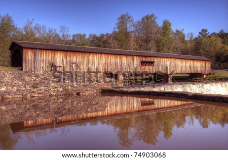 An historic covered bridge at Watson Mill Bridge State Park near Comer in Northeast Georgia, USA. Old Film Effect.