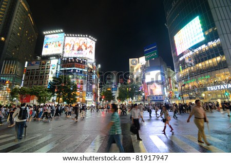 TOKYO, JAPAN - JULY 19: Shibuya crossing is one of the largest and most famed examples of a scramble crosswalk in the world on July 19, 2011 in Tokyo, Japan.
