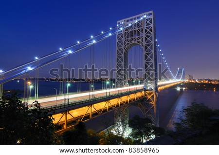 The George Washington Bridge spanning the Hudson River at twilight in New York City.
