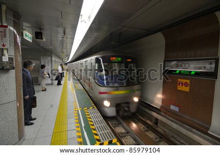 TOKYO - JULY 5: Train arrives on the Oedo Line at Tochomae Station July 5, 2011 in Tokyo, Japan. The line is Tokyo\'s first linear motor metro line.