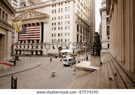 NEW YORK CITY - AUGUST 24: Wall Street on August 24, 2011 in New York, NY. Wall St is the home of New York Stock Exchange, the world\'s largest stock exchange by market capitalization.
