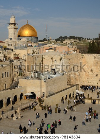 JERUSALEM - FEBRUARY 23: Crowds at the Western Wall below the Dome of the Rock on the Temple Mount February 23, 2012 in Jerusalem, IL. The Temple Mount is the holiest site in Judaism.