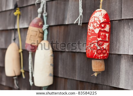 Buoys decorating a wall in Mystic, Connecticut, New England, United States of America, North America