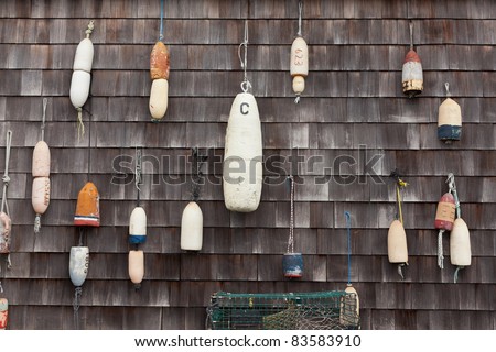Buoys hanging on a wall in Mystic, Connecticut, New England, United States of America, North America