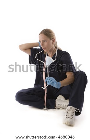 Young blond woman in medical scrubs