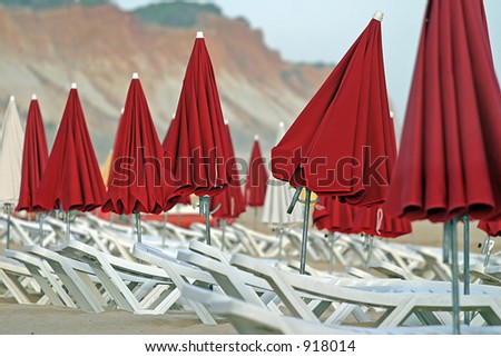 Beach Chairs and Umbrellas. Algarve, Portugal.