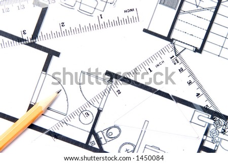 A yellow pencil and a geometric tools on top of floor plan.