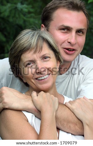 Mother and her son. Focus on woman\'s face.