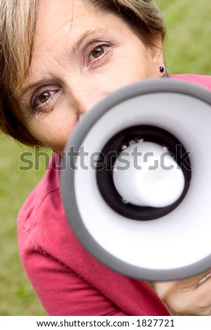 Woman shouting through the megaphone