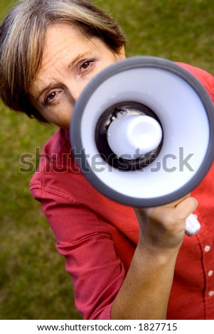 Woman yelling through the megaphone