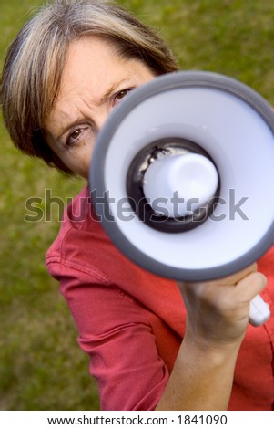 Middle-aged woman with a megaphone.