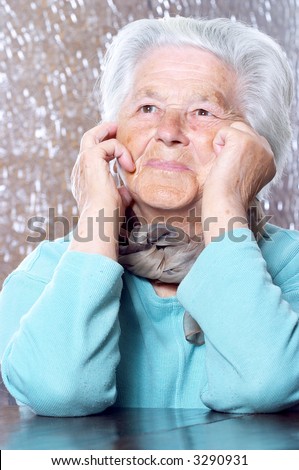Elderly woman (91 year old) bringing back memories