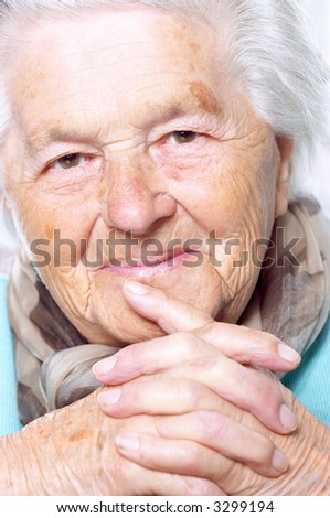 Senior woman with her hands clasped